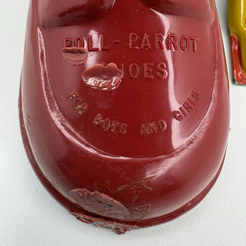 Vintage Poll-Parrot Shoes Plastic Bank w Tin Clicker Noisemaker Advertising