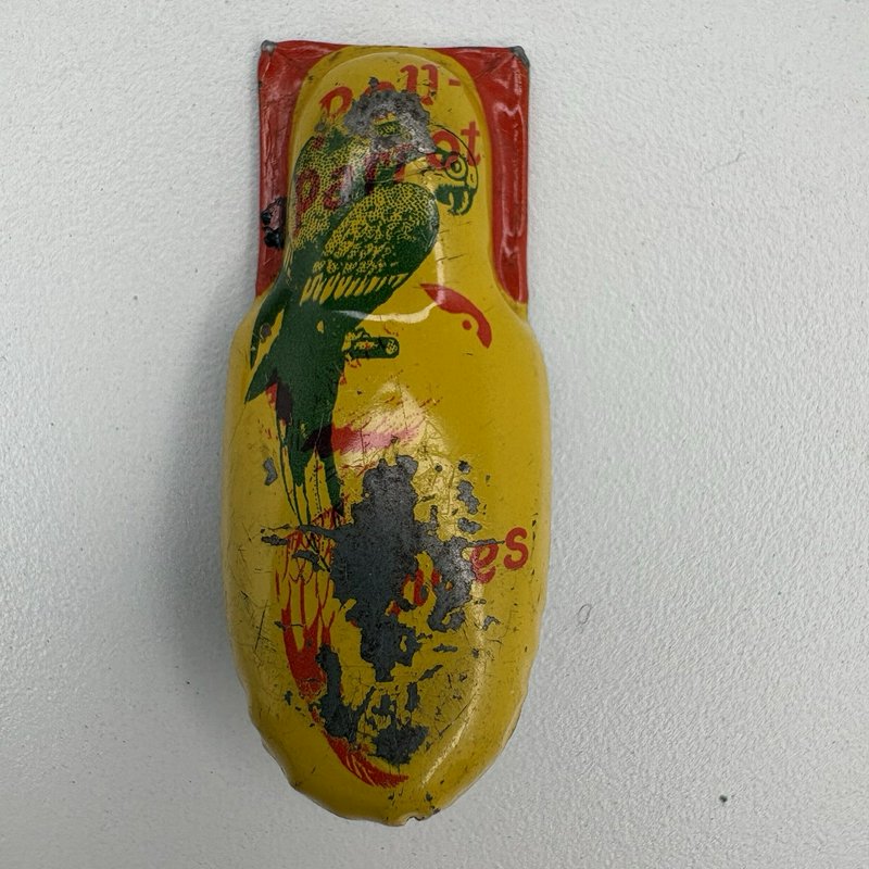 Vintage Poll-Parrot Shoes Plastic Bank w Tin Clicker Noisemaker Advertising