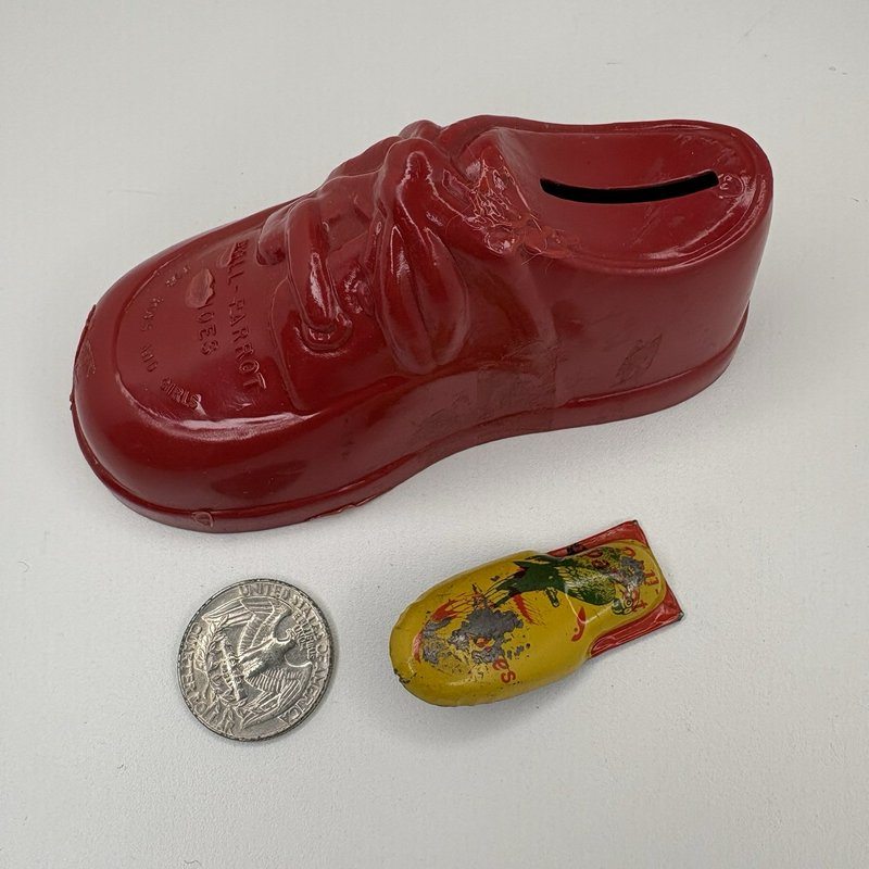 Vintage Poll-Parrot Shoes Plastic Bank w Tin Clicker Noisemaker Advertising