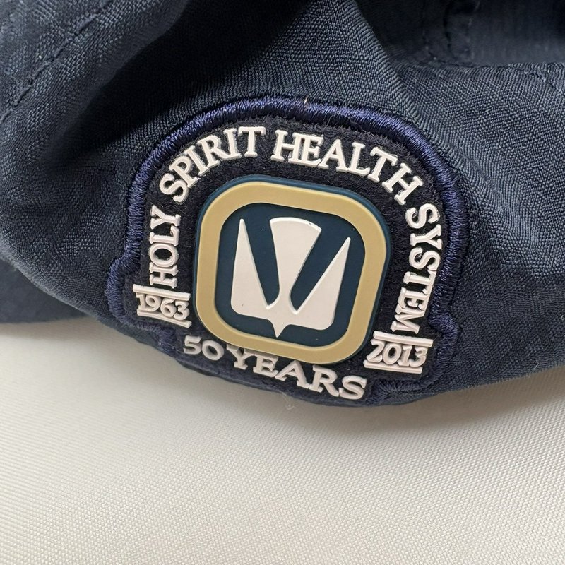 Titleist Dickie McCamey Holy Spirit Health 50 Years Navy Golf Hat