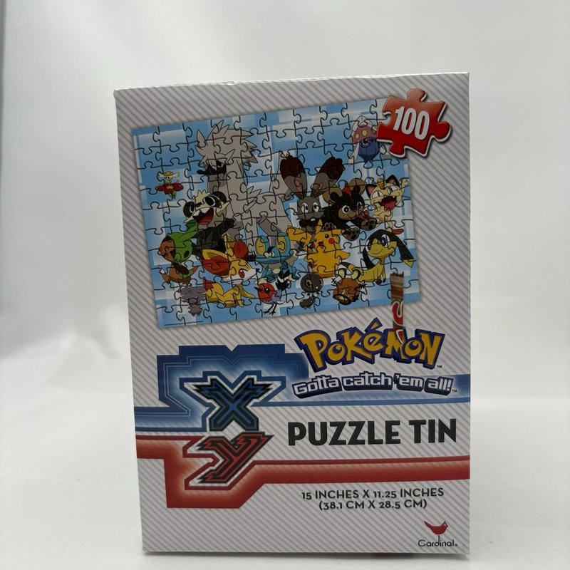Pokemon XY Puzzle Tin Pokeball 100 Piece Cardinal Jigsaw 15x11.25 New