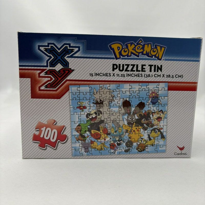 Pokemon XY Puzzle Tin Pokeball 100 Piece Cardinal Jigsaw 15x11.25 New