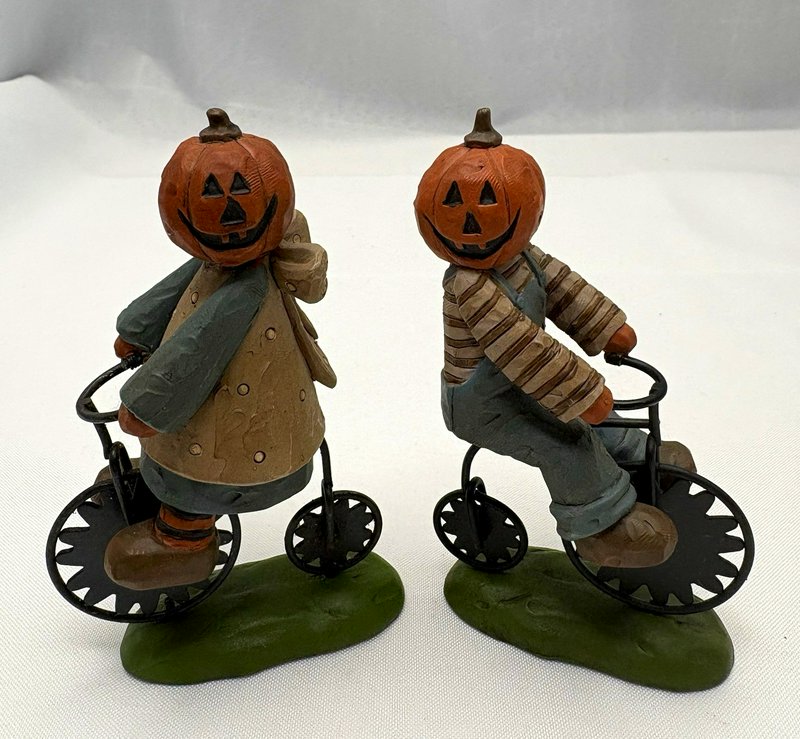 Suzi Skoglund Halloween Pumpkin Head Bicycle Figurines Set of 2 Folk Art